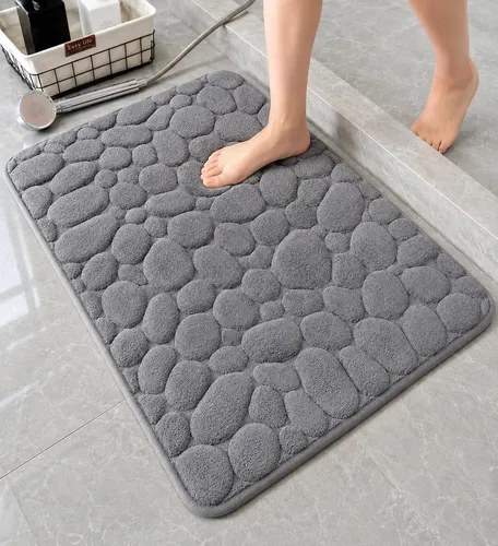 Tapete cinza com textura de pedras no piso do banheiro, foto do anúncio do produto no Mercado Livre