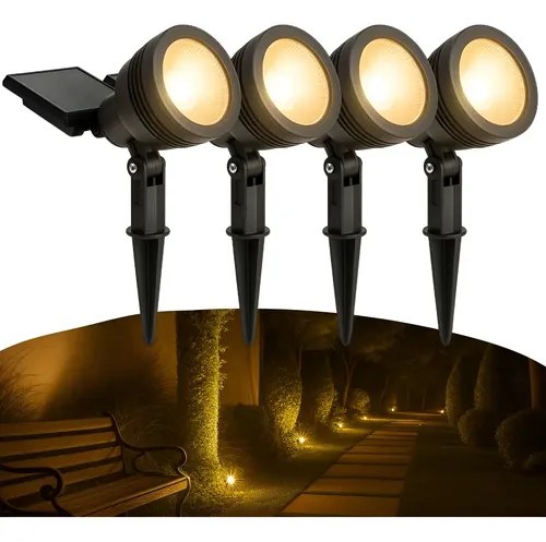 Quatro luminárias solares pretas de espeto com painel solar e caminho iluminado, foto do anúncio do produto no Mercado Livre